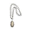 Petrified walrus tusk and diamond necklace